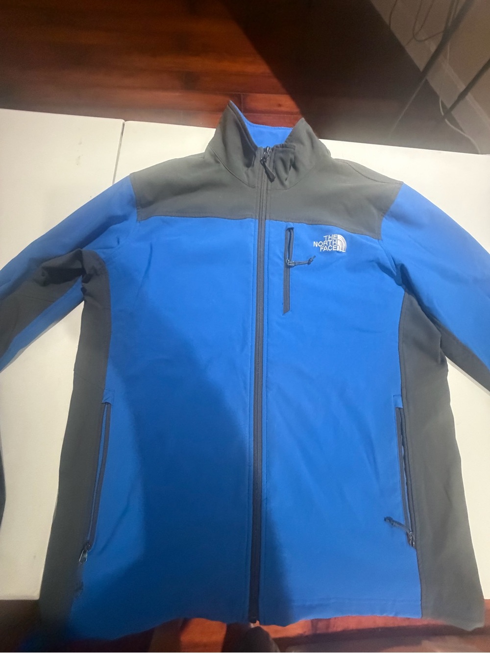 The North Face Men’s Blue and Gray Performance Softshell Jacket